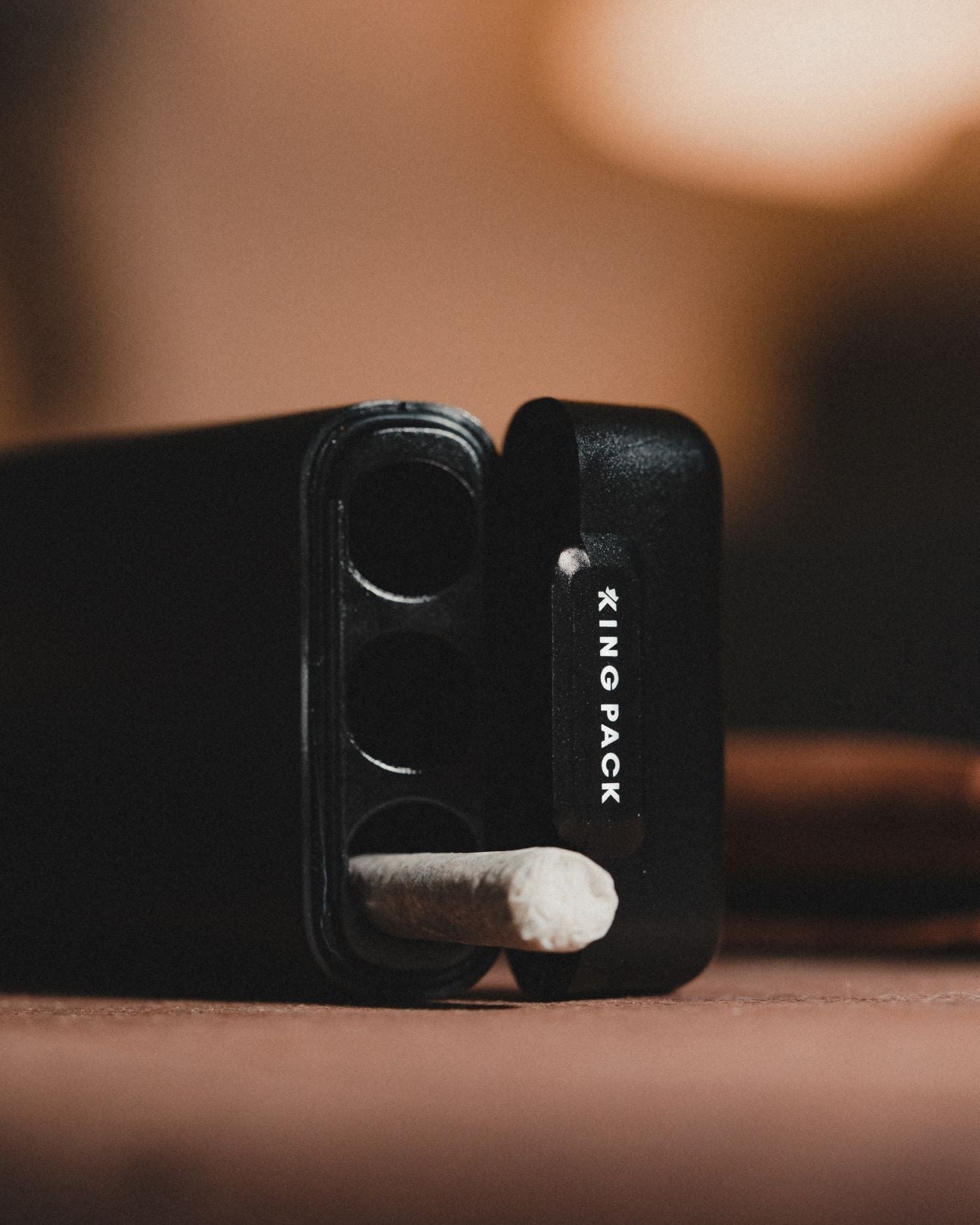 matte black Kingpack case on floor with one visible joint